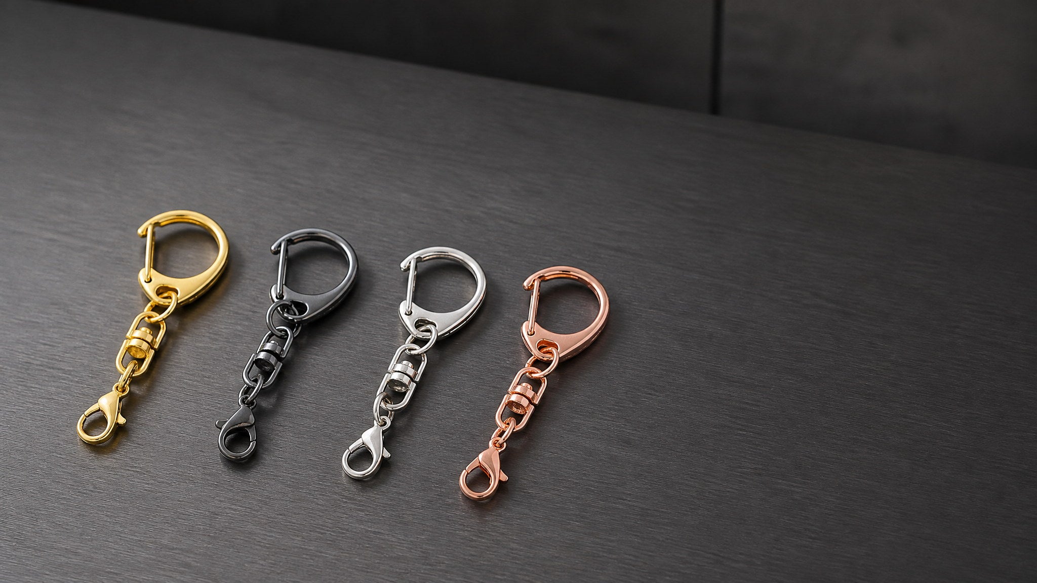 Metal keychain and bag hardware clasps in gold, black, silver and rose gold finishes